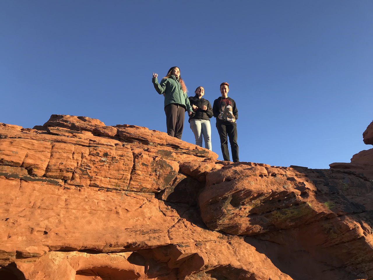 Tufts students on Jurassic Aztec Sandstong Fm., Valley of Fire, Nevada. January 2022 Death Valley Fieldtrip.